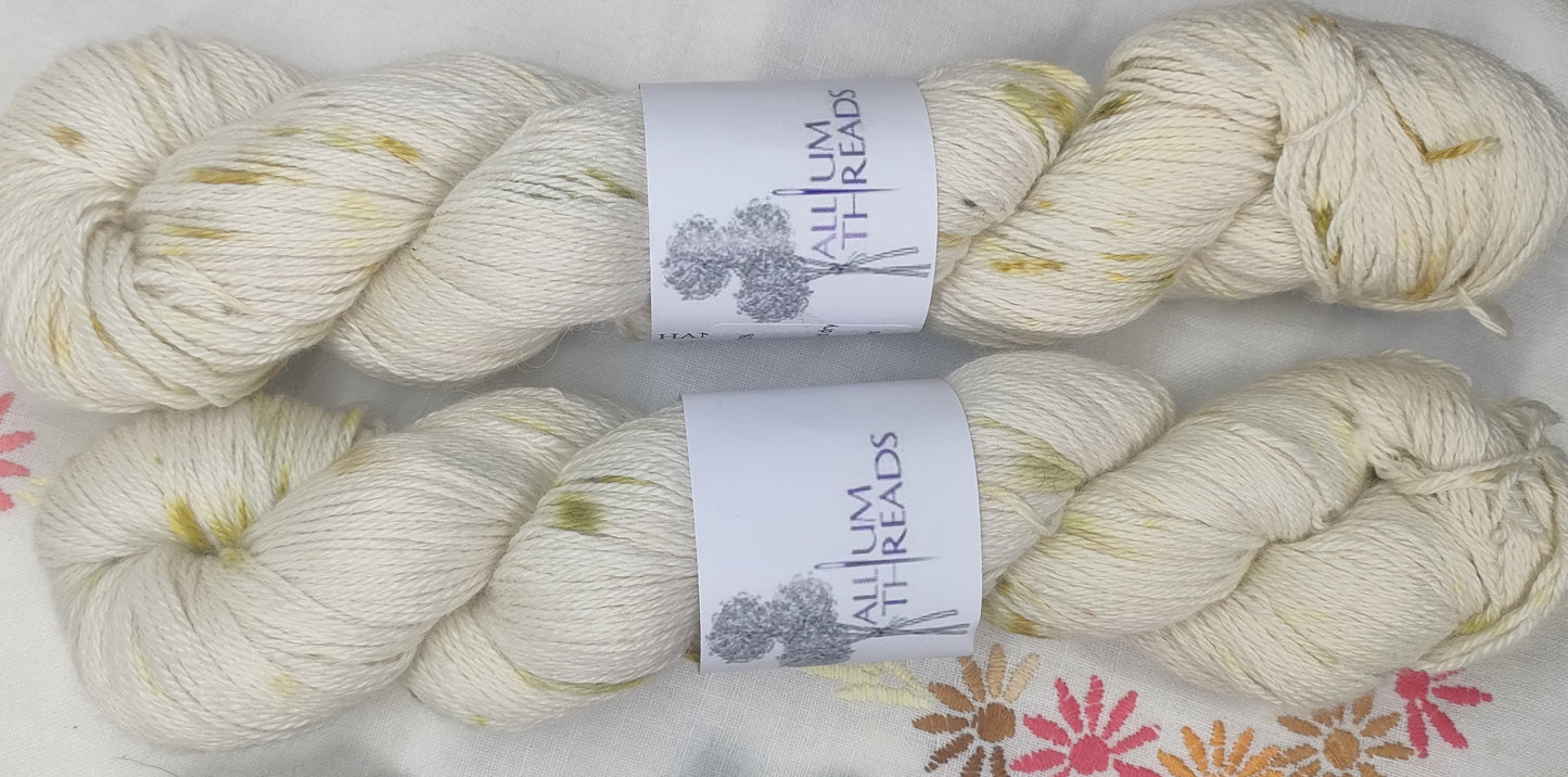 Speckled cream bundle dyed alpaca silk cashmere four ply yarn