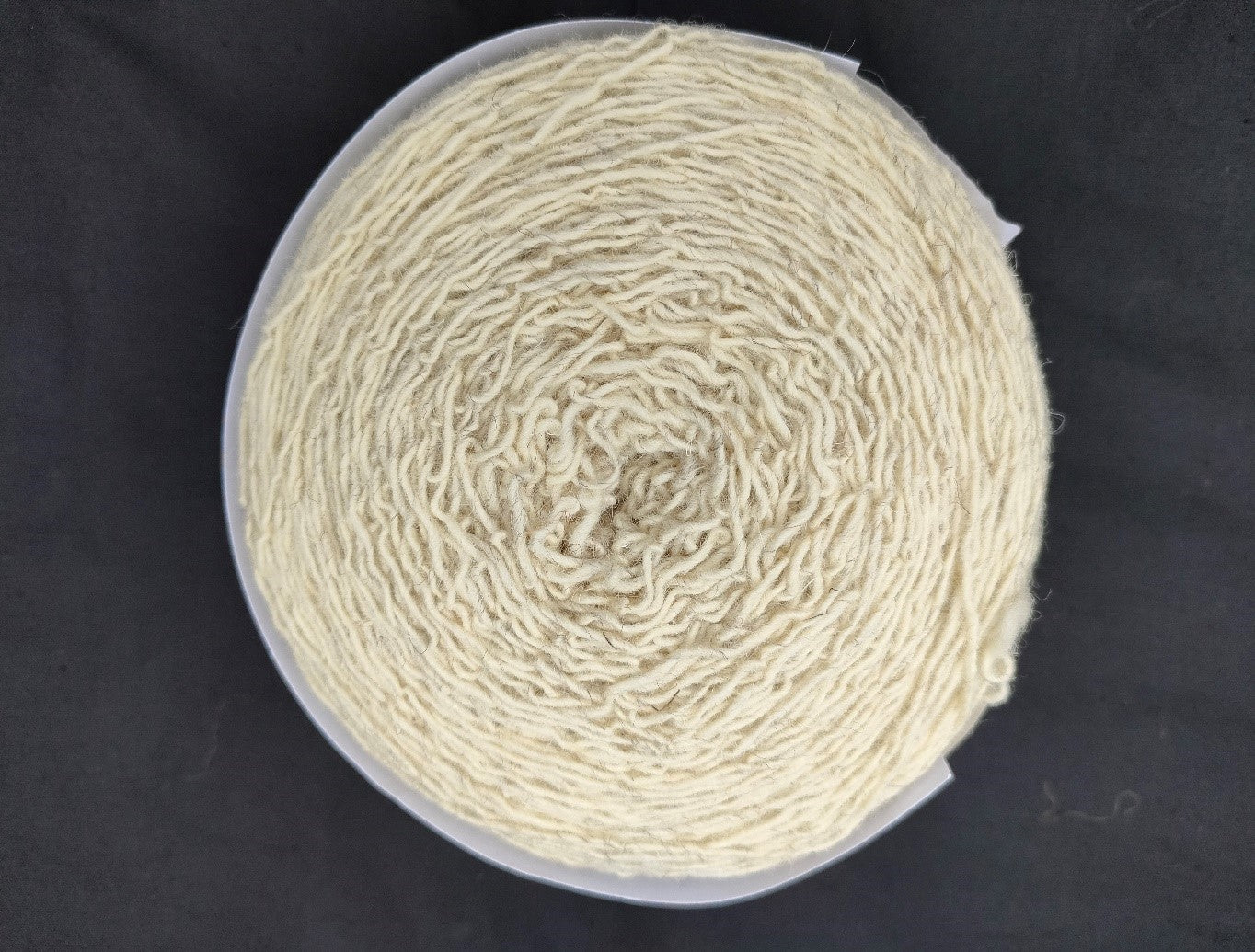 Undyed cream four ply Romney Cross Shetland regenerative yarn