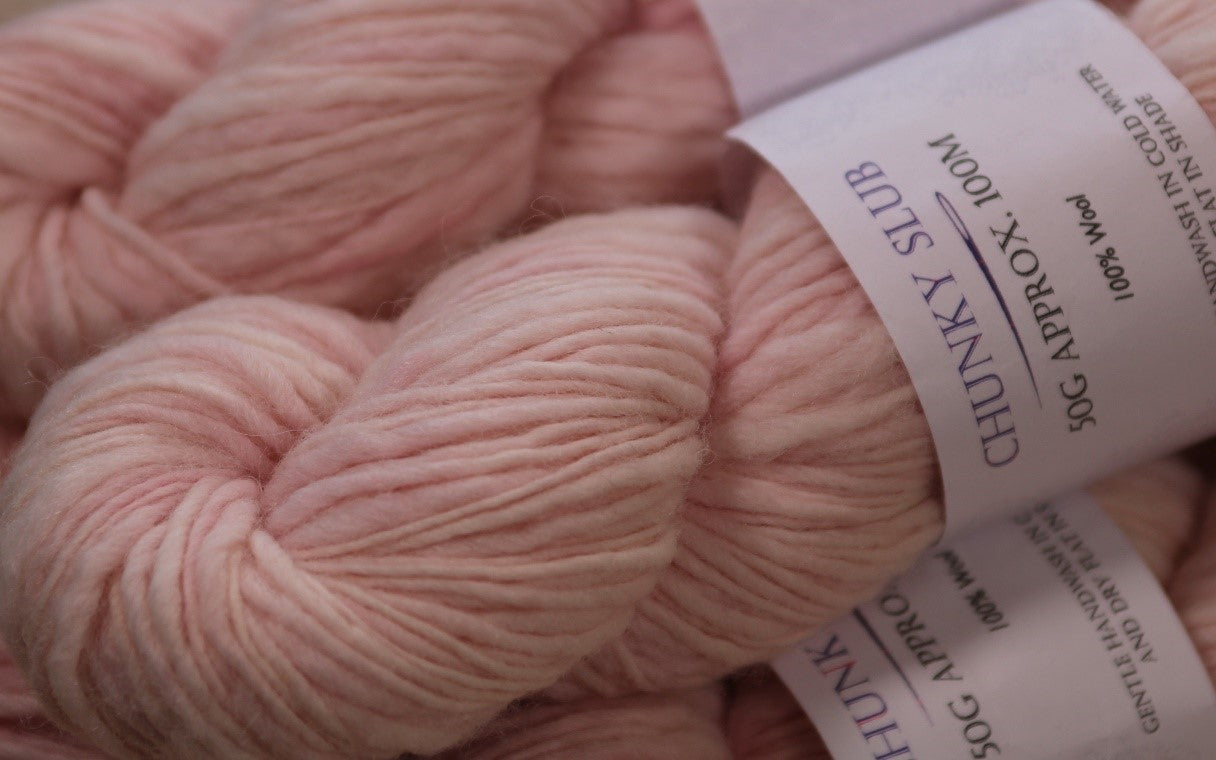 Pink chunky slubby wool singles yarn