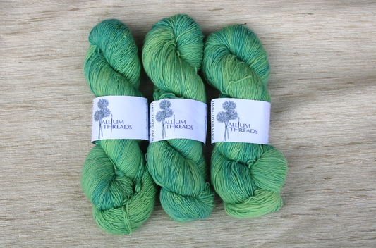 Bright green four ply merino singles high twist yarn
