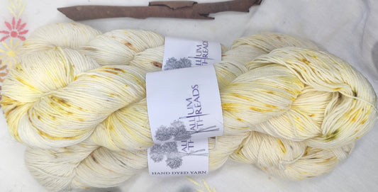 Speckled cream bundle dyed merino nylon four ply yarn