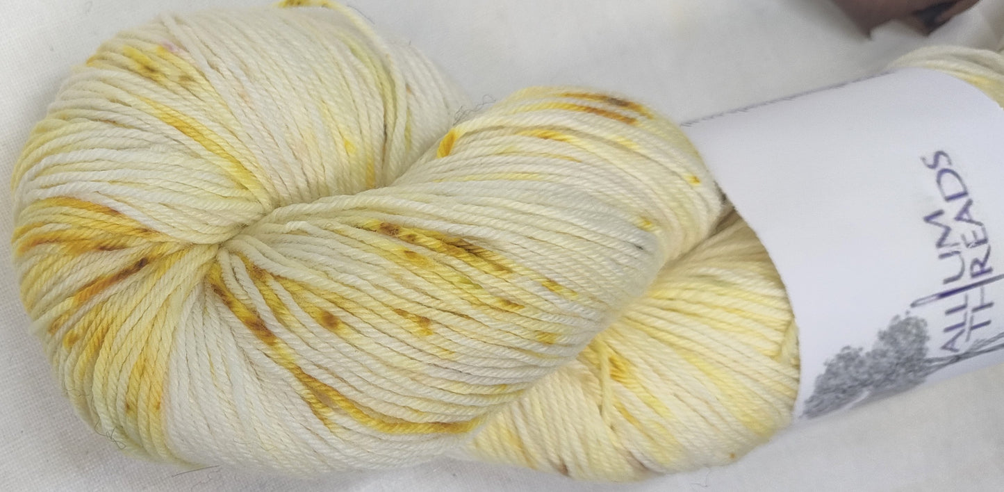 Speckled cream bundle dyed merino nylon four ply yarn