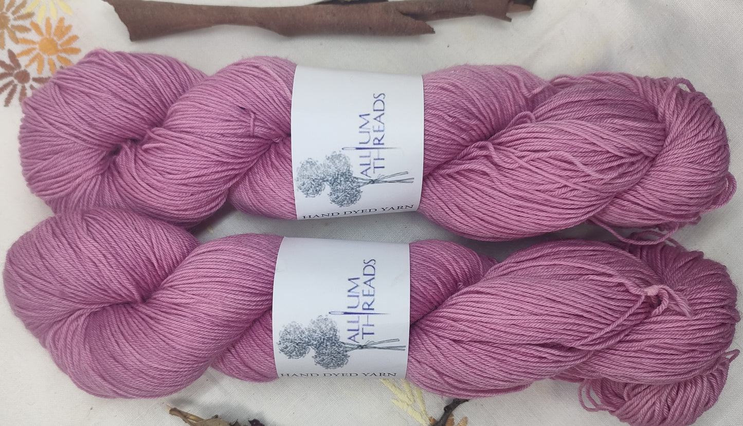Marbled pink merino nylon four ply yarn