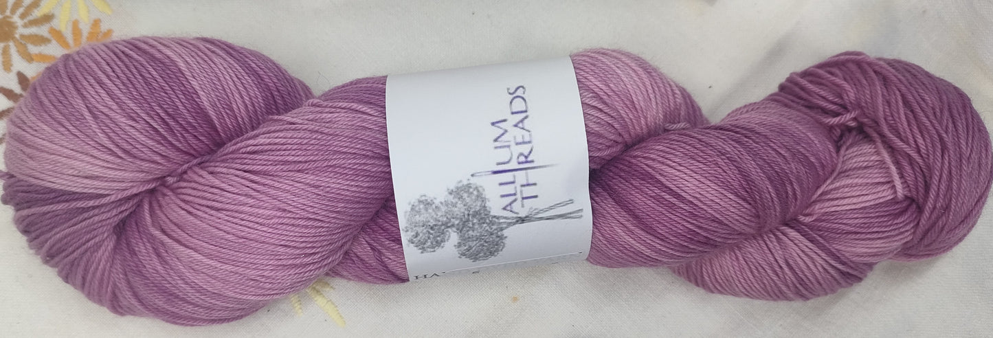 Marbled pink merino nylon four ply yarn