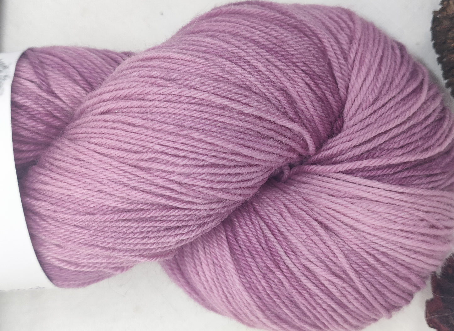 Marbled pink merino nylon four ply yarn