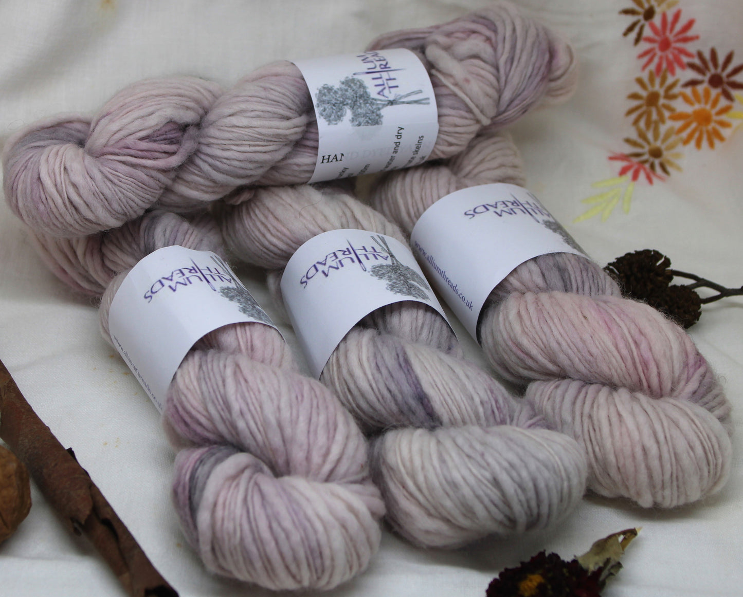 Pink and purple chunky slubby wool singles yarn