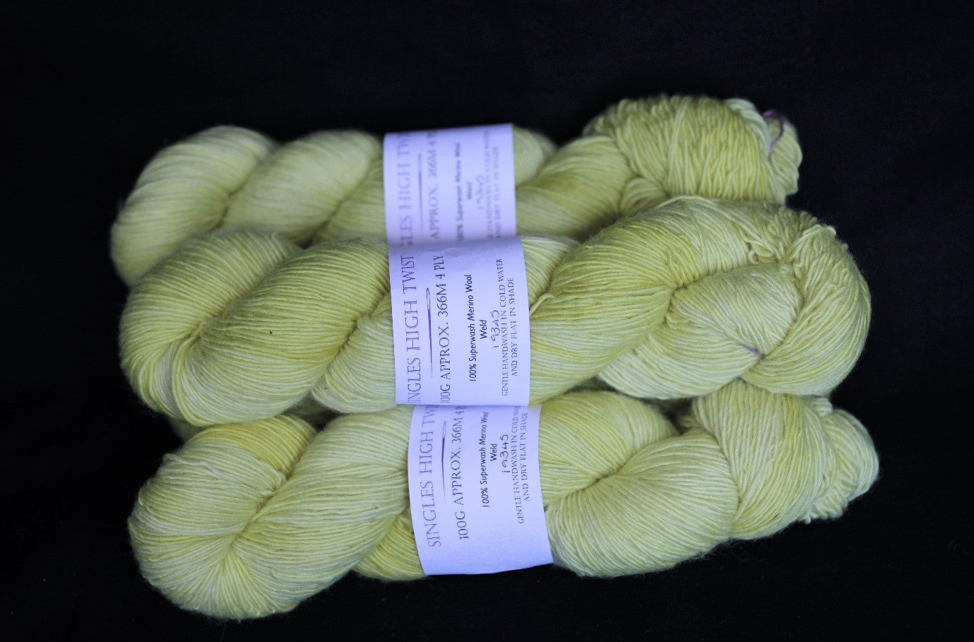 Yellow four ply merino singles high twist yarn